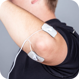 Pain free PAT Electrodes on elbow treating pain