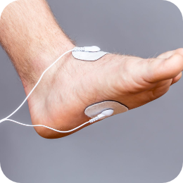 Pain free PAT Electrodes on foot treating pain